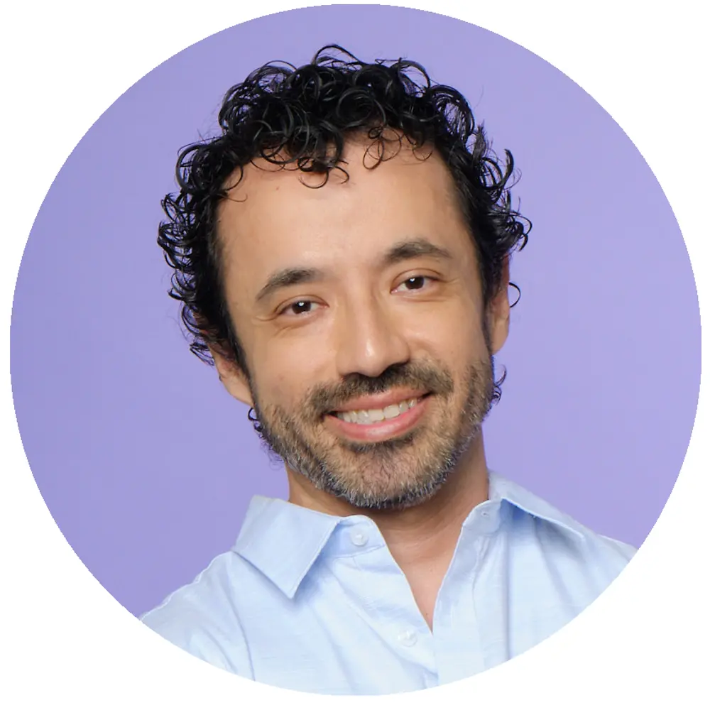 Headshot of man smiling at camera