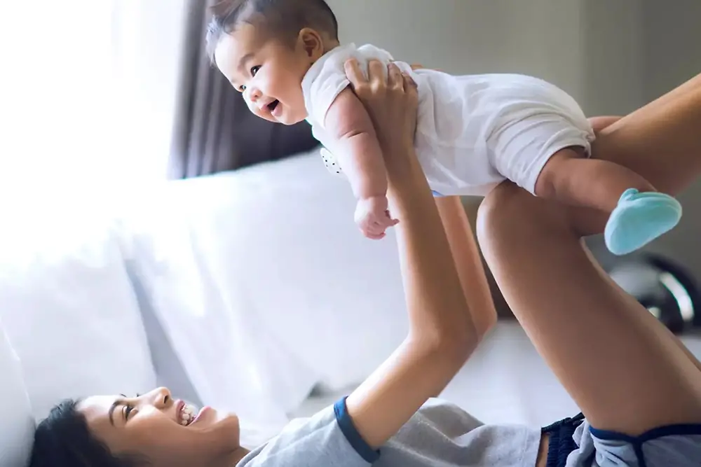 Woman holding a baby