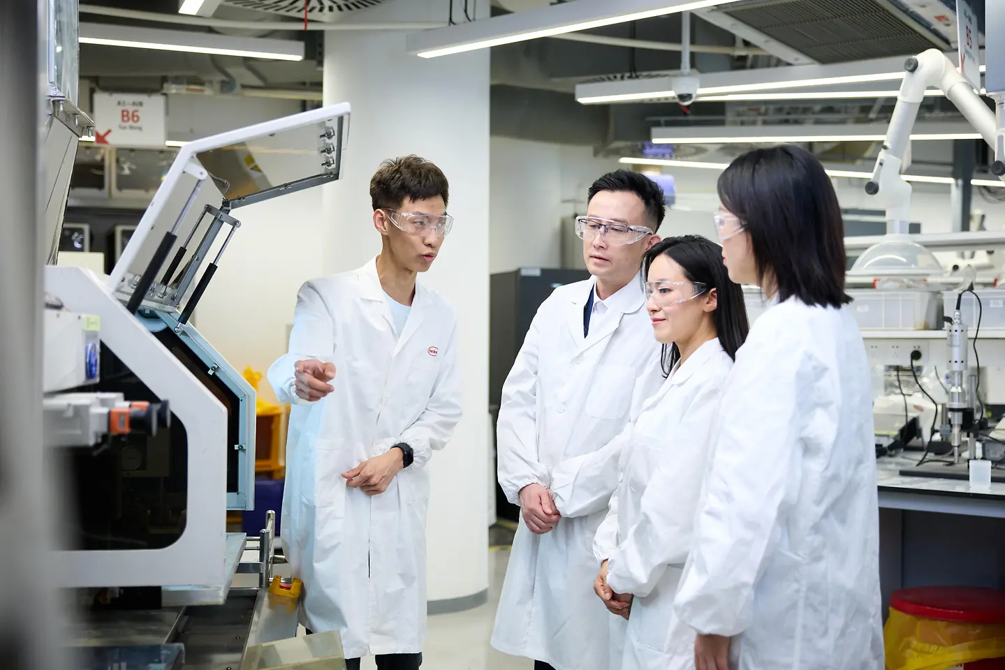 Customers and lab technicians are exploring the Lab of Printing Technologies at the Henkel Adhesive Technologies - Inspiration Center Shanghai.