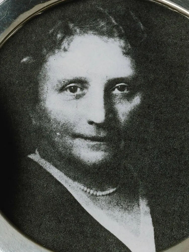 Black and white photograph of Martha Schwarzkopf in an oval metallic frame