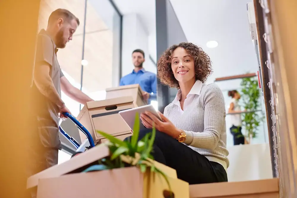 Woman working with filling boxes.