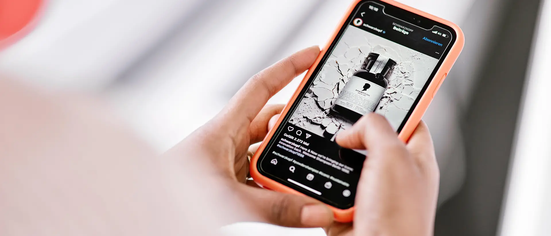 A photo crop of a hand holding a smartphone.